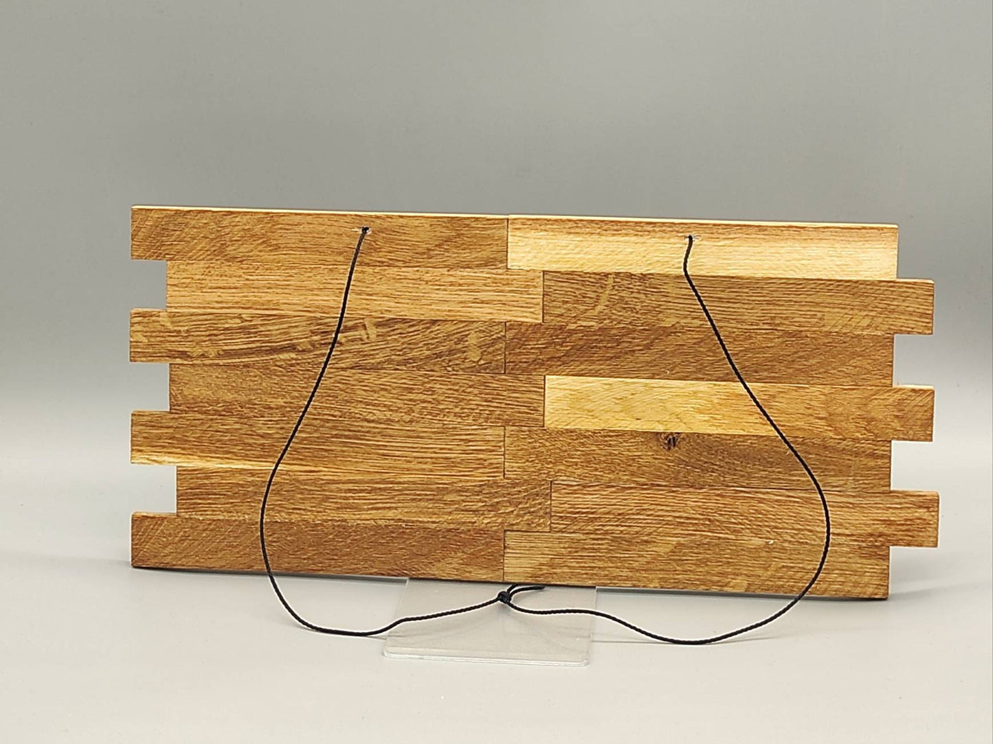 Holzschild mit Spruch "Lebe, Lache, Liebe"
